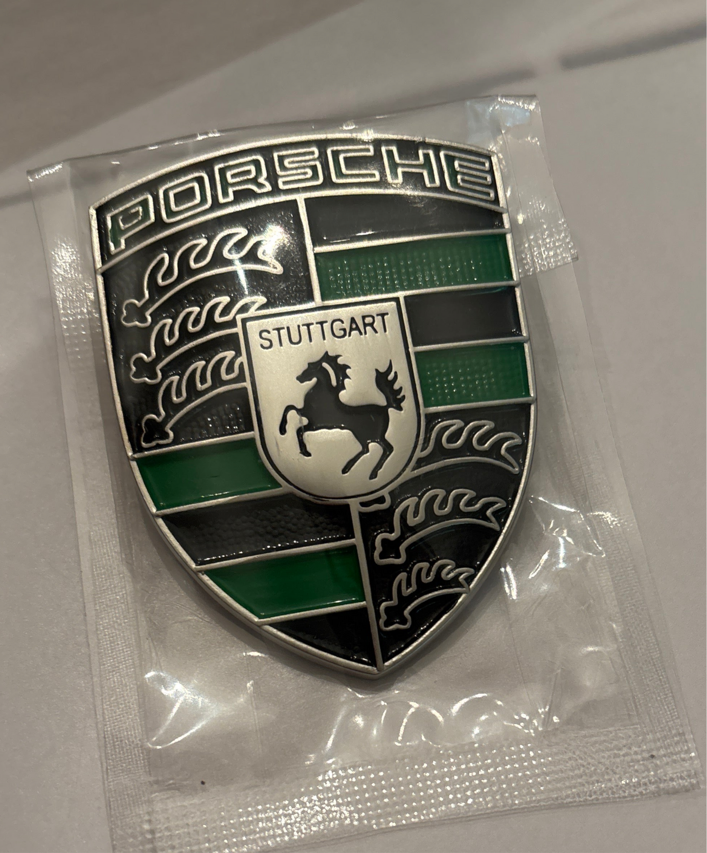 Porsche Metal Crest hood badge, green and black