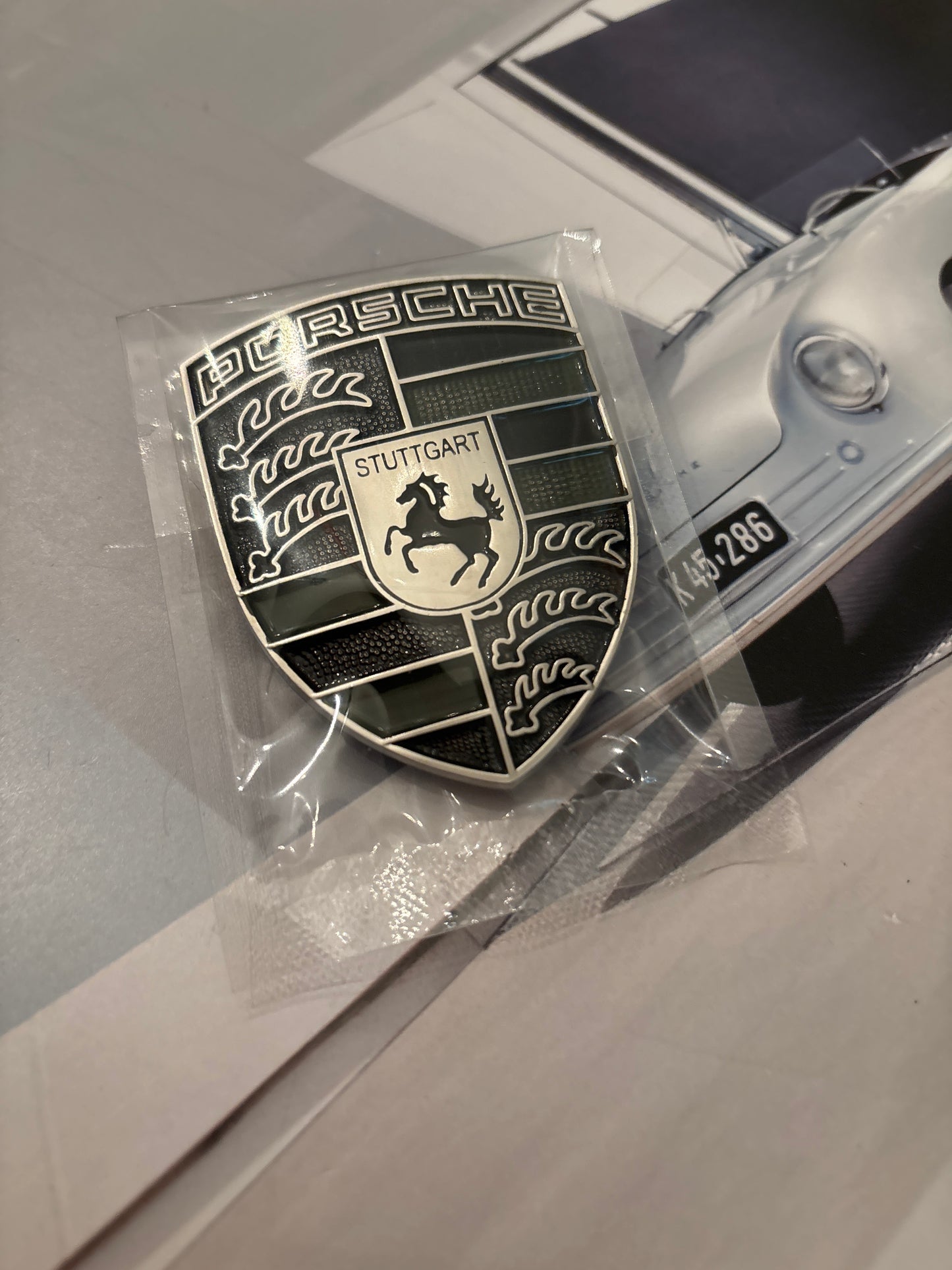 Porsche Crest hood badge green black with the Steel look