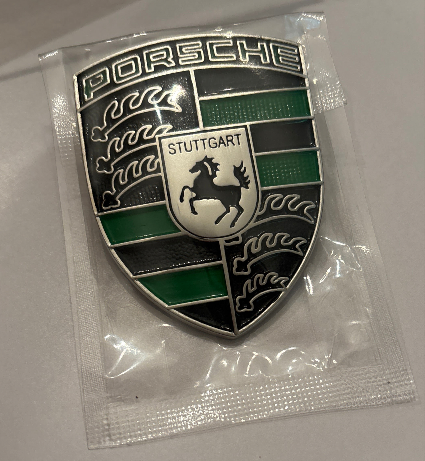 Porsche Metal Crest hood badge, green and black