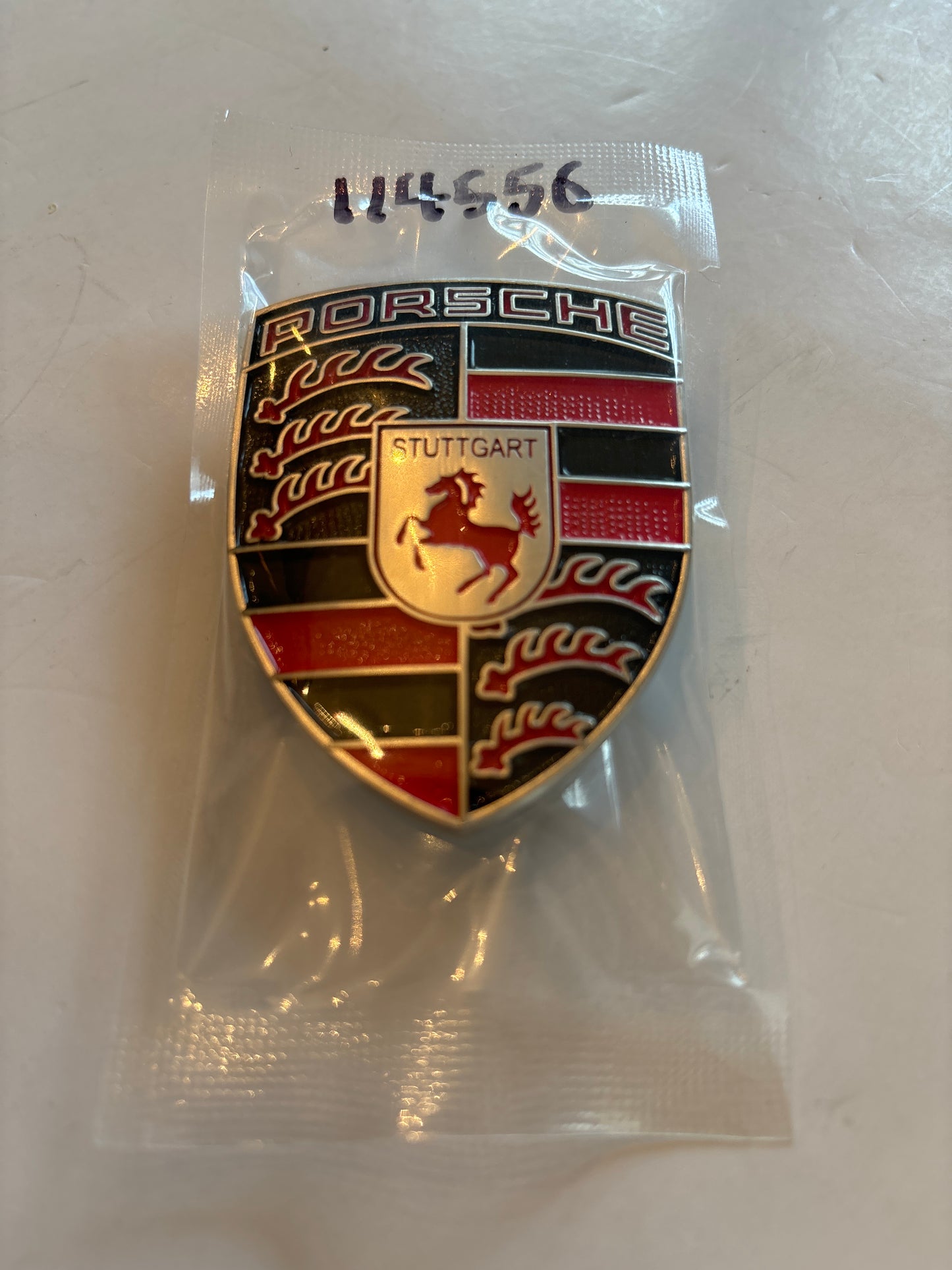 Porsche hood badge, red silver black