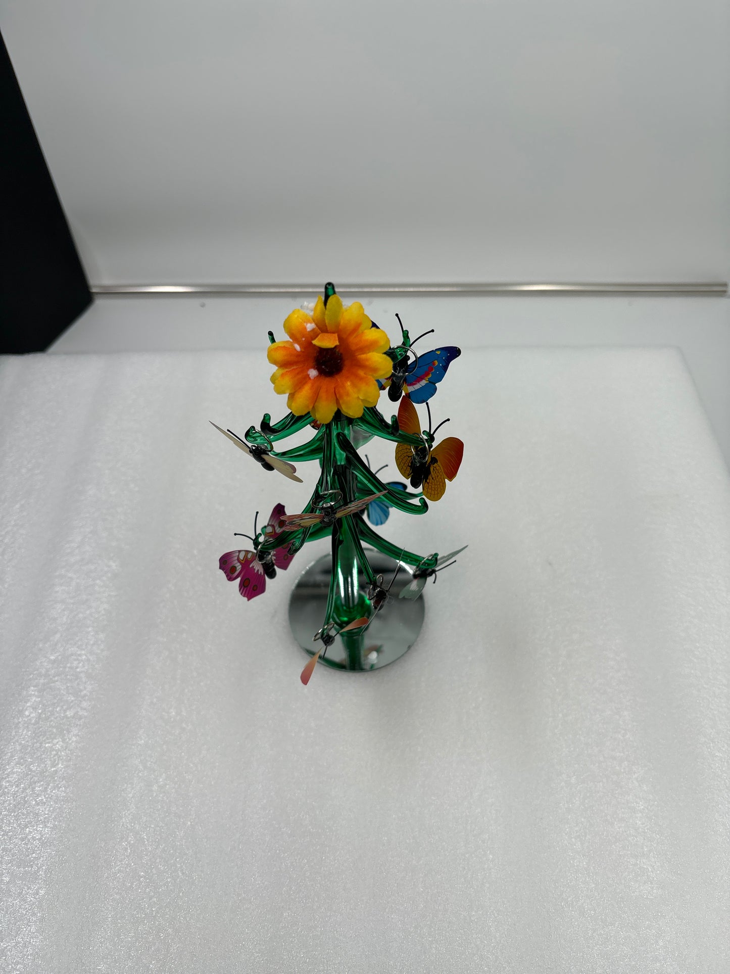 Green glass ornamental butterfly tree