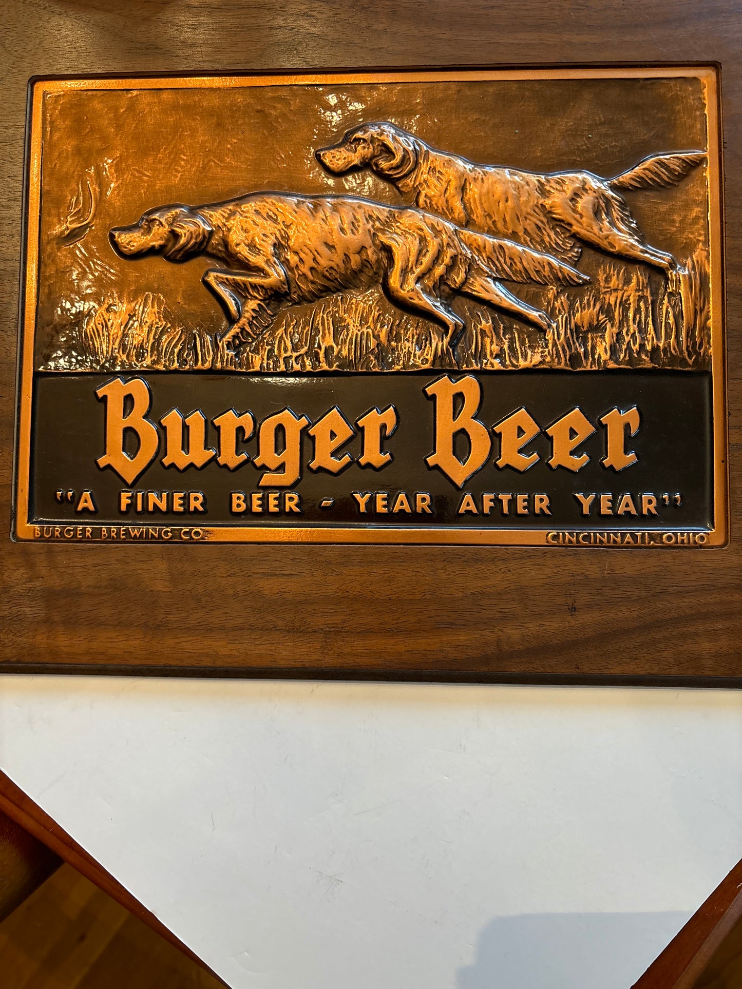 Vintage 1950’s Burger beer hammered, copper Bird Dog advertisement
