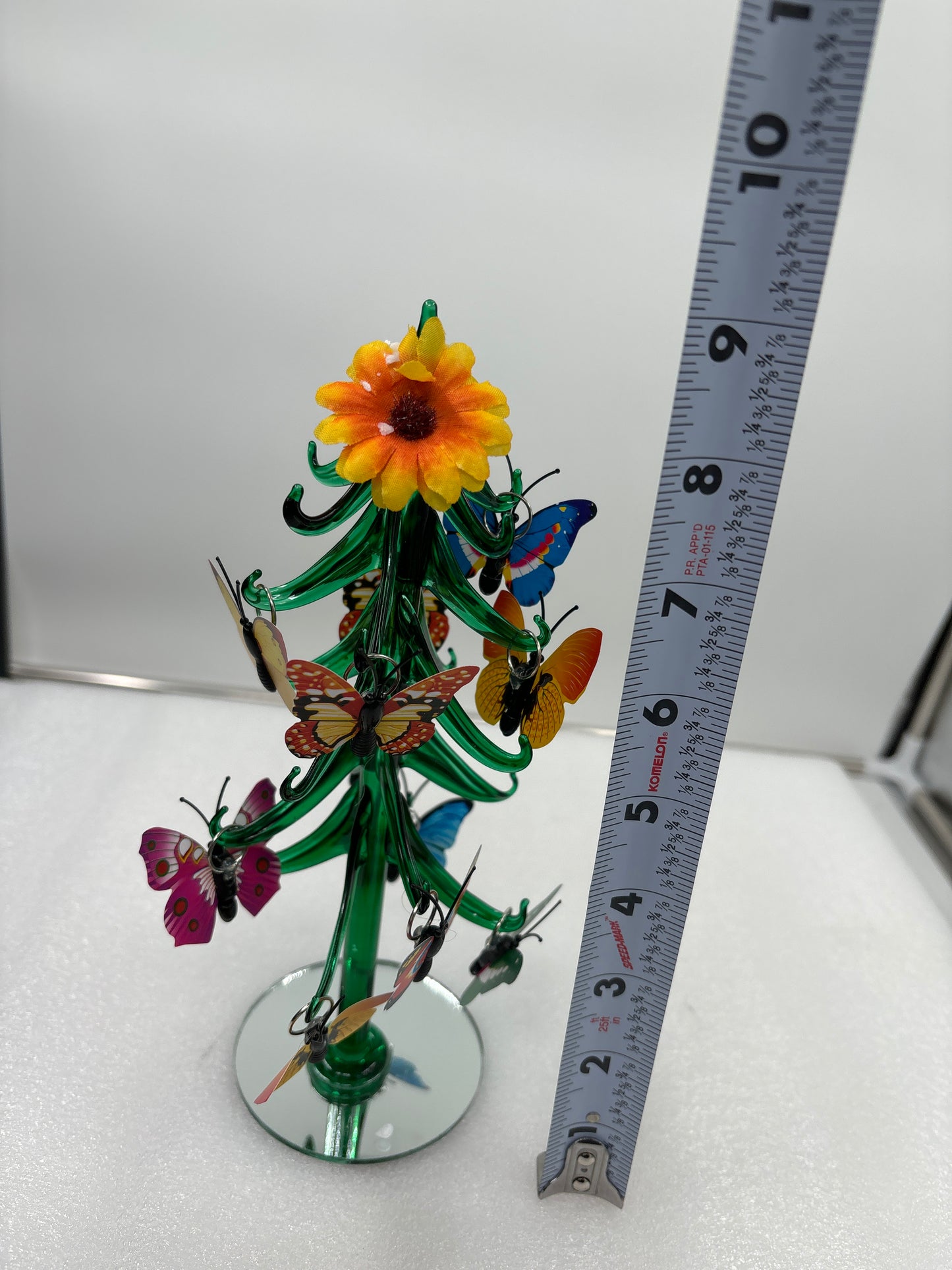 Green glass ornamental butterfly tree