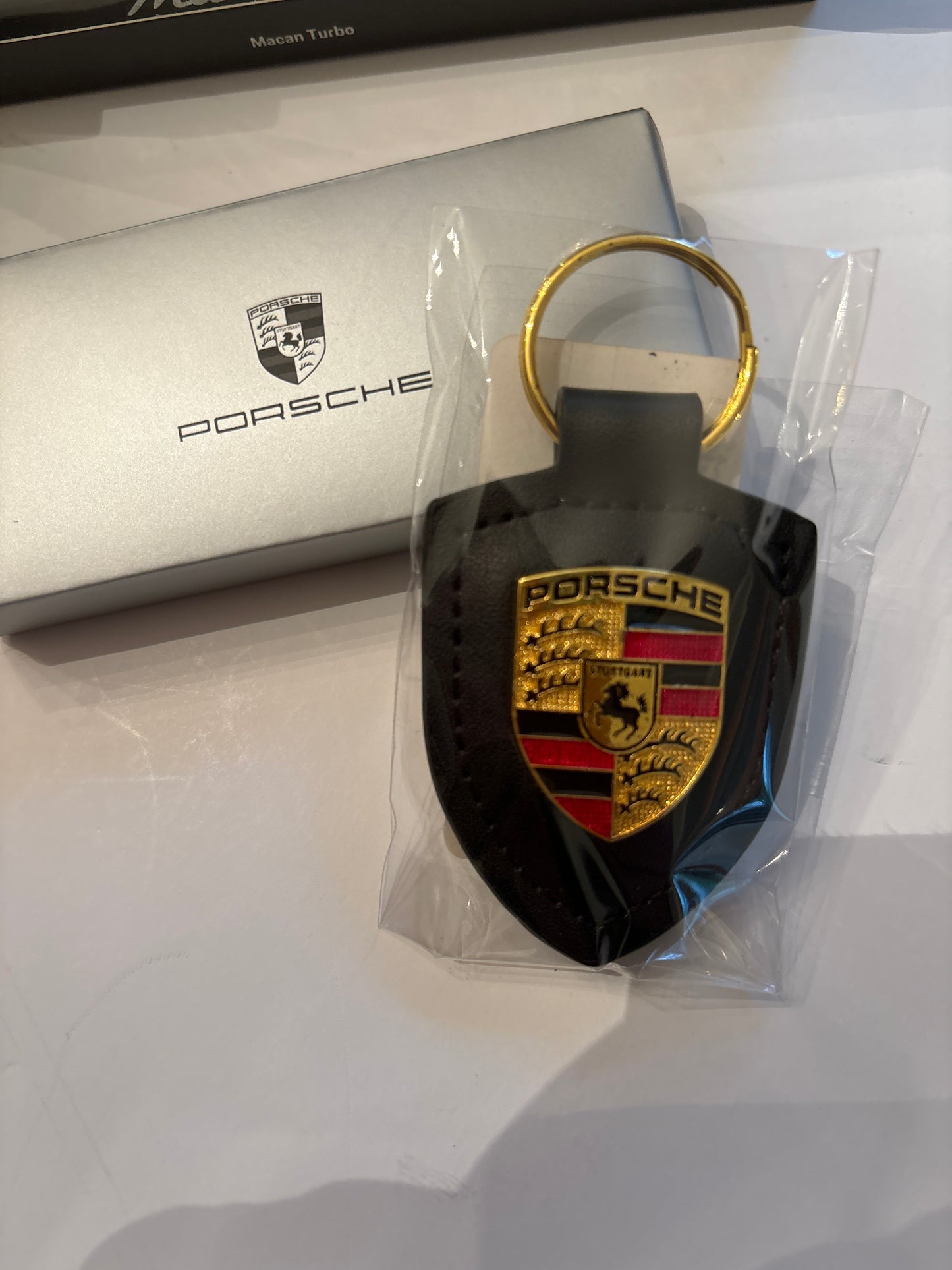 New Porsche Crest leather keychain, black