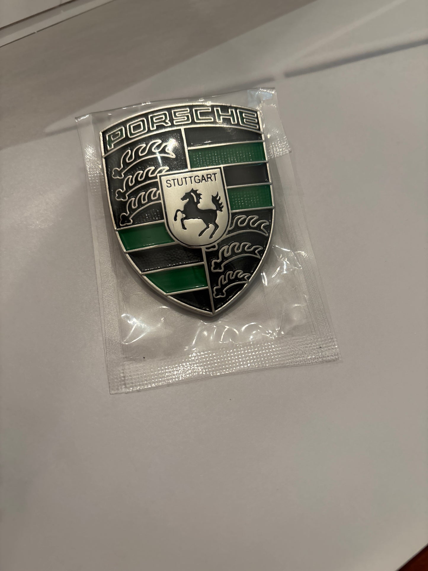 Porsche Metal Crest hood badge, green and black