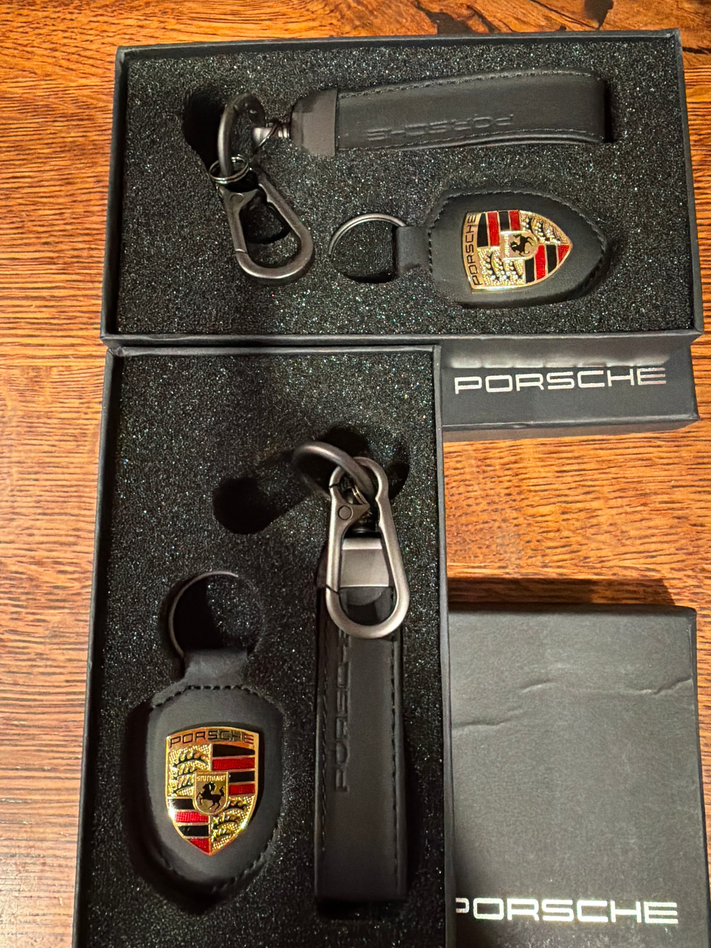 Porsche DUO Leather Crest keychain Black