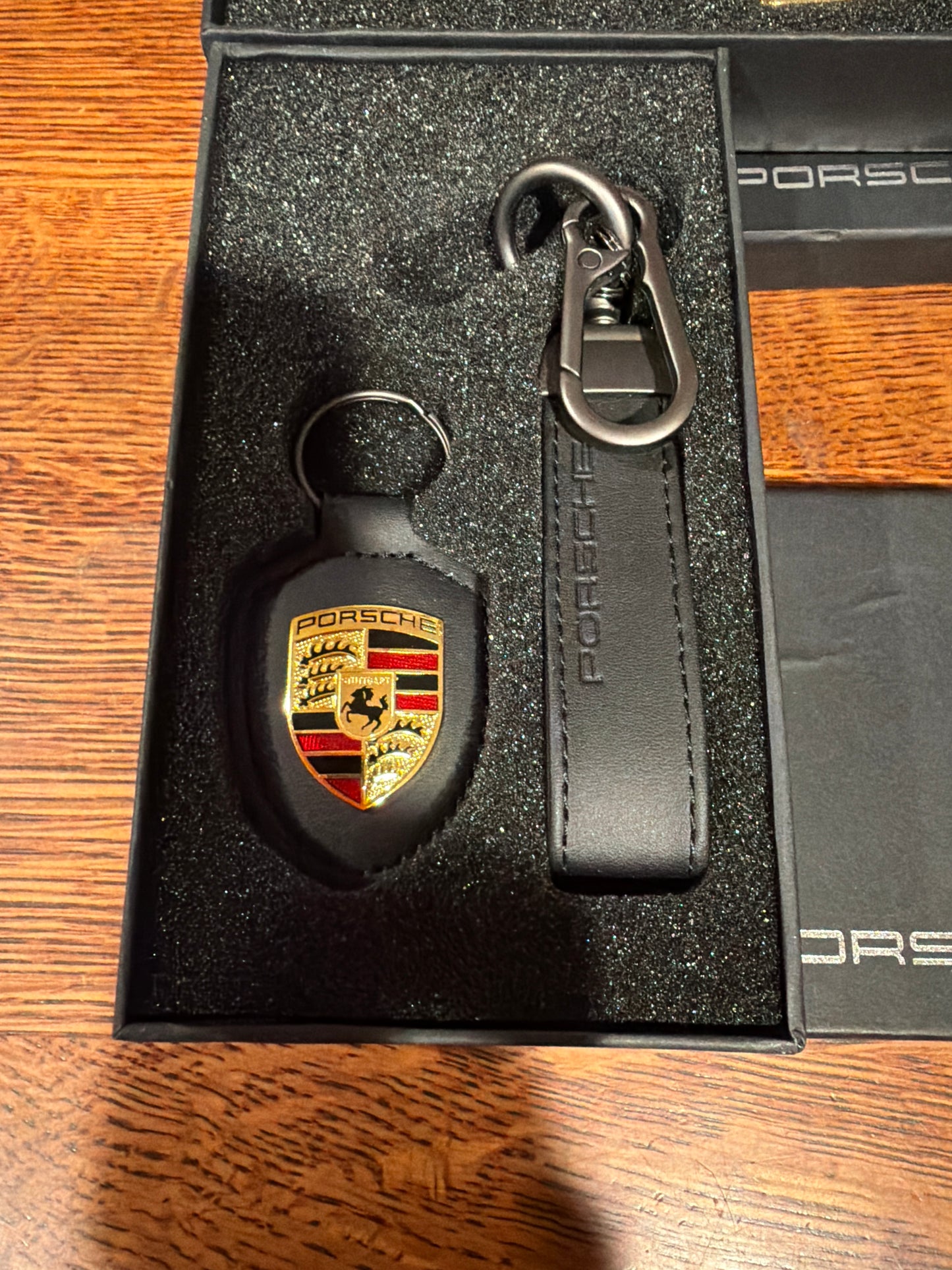 Porsche DUO Leather Crest keychain Black