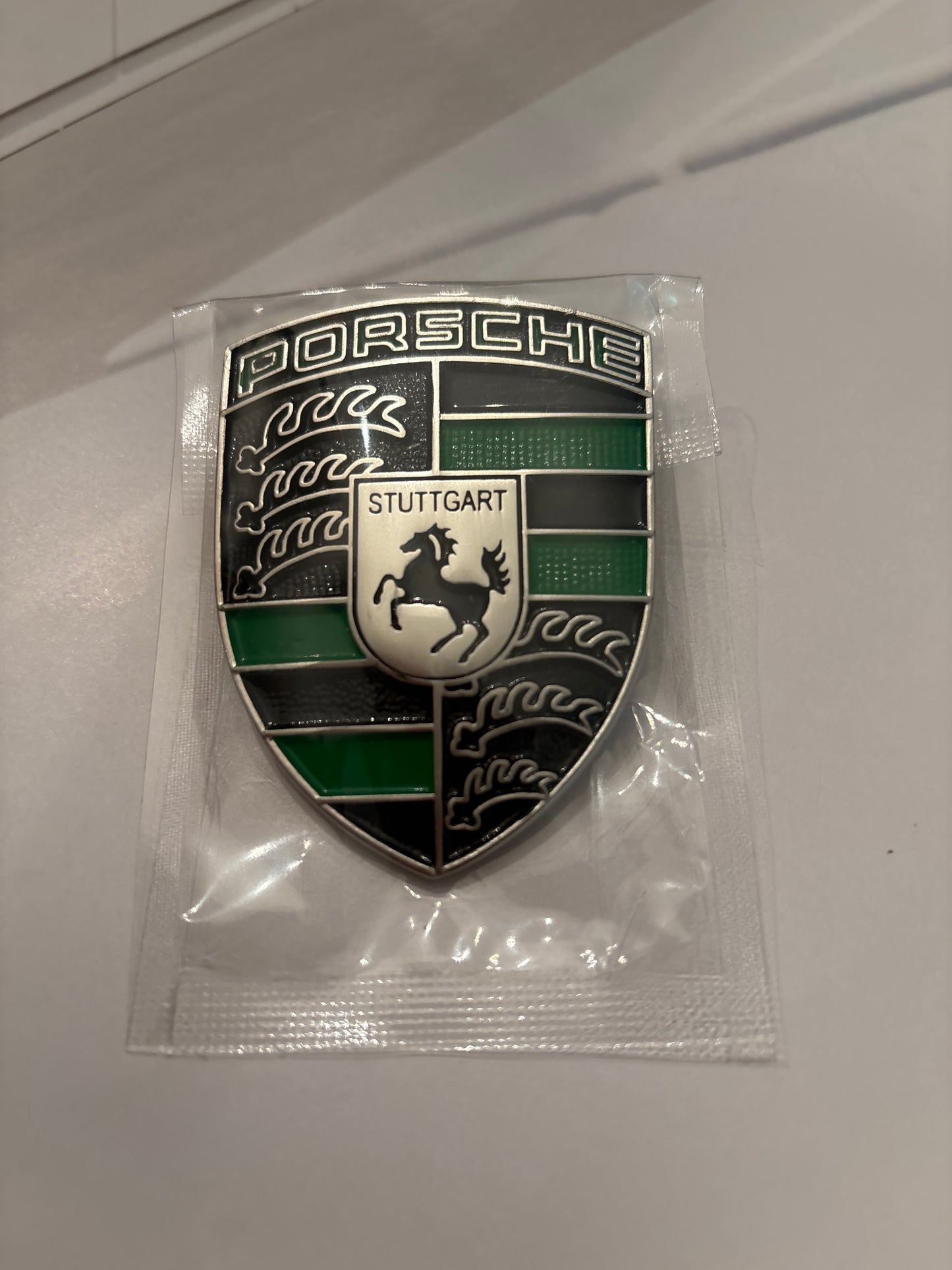 Porsche Metal Crest hood badge, green and black